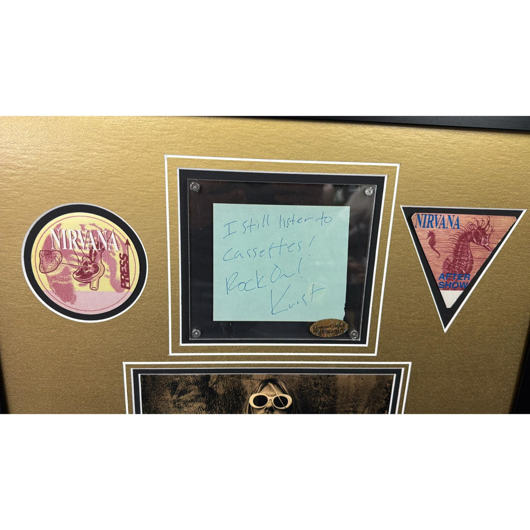 Kurt Cobain Nirvana signed with inscription autograph page book and a museum quality frame 27x36.