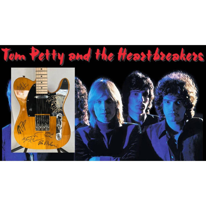 Tom Petty (with sketch) and The Heartbreakers, Ron Blair, Benmont Tench, Scott Thurston, and Mike Campbell full size electric guitar signed