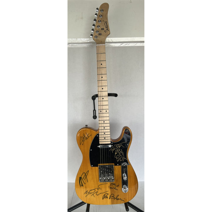 Tom Petty (with sketch) and The Heartbreakers, Ron Blair, Benmont Tench, Scott Thurston, and Mike Campbell full size electric guitar signed