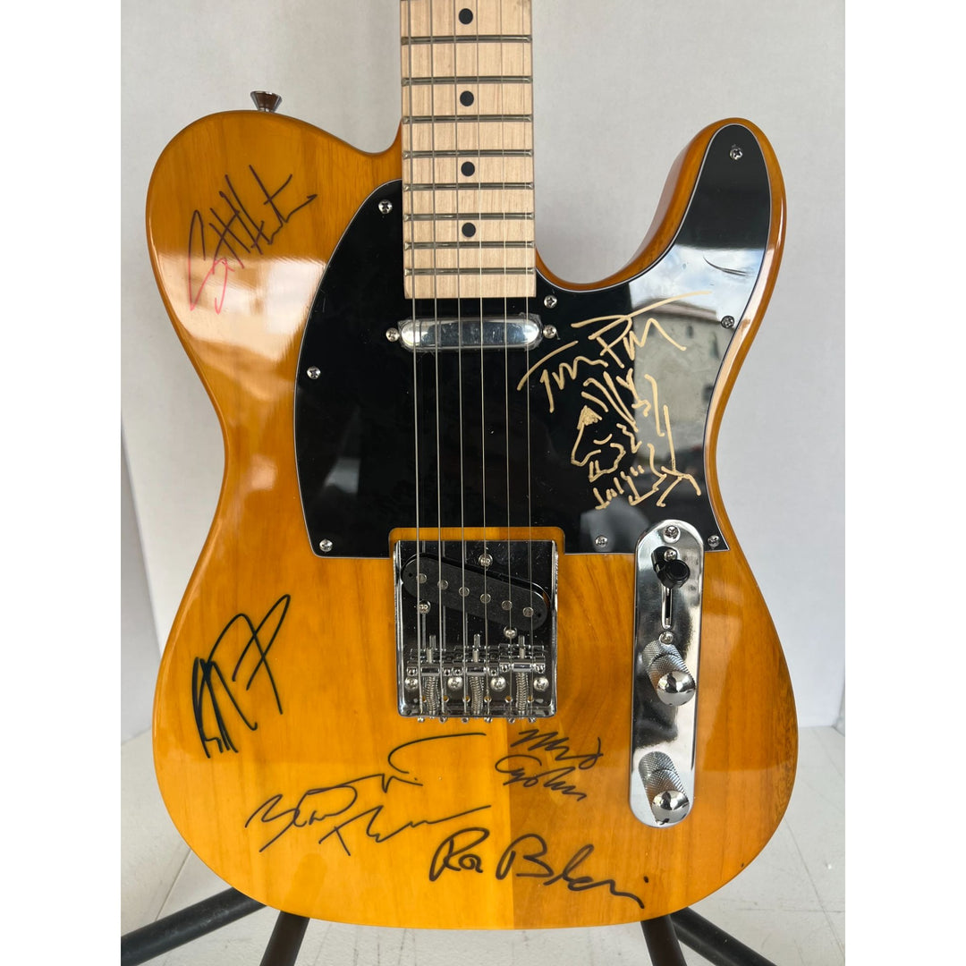 Tom Petty (with sketch) and The Heartbreakers, Ron Blair, Benmont Tench, Scott Thurston, and Mike Campbell full size electric guitar signed