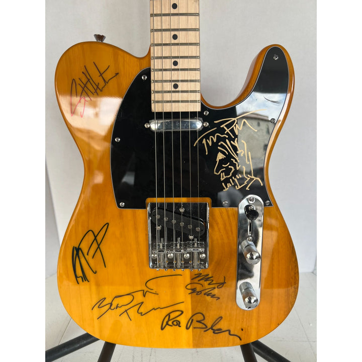 Tom Petty (with sketch) and The Heartbreakers, Ron Blair, Benmont Tench, Scott Thurston, and Mike Campbell full size electric guitar signed