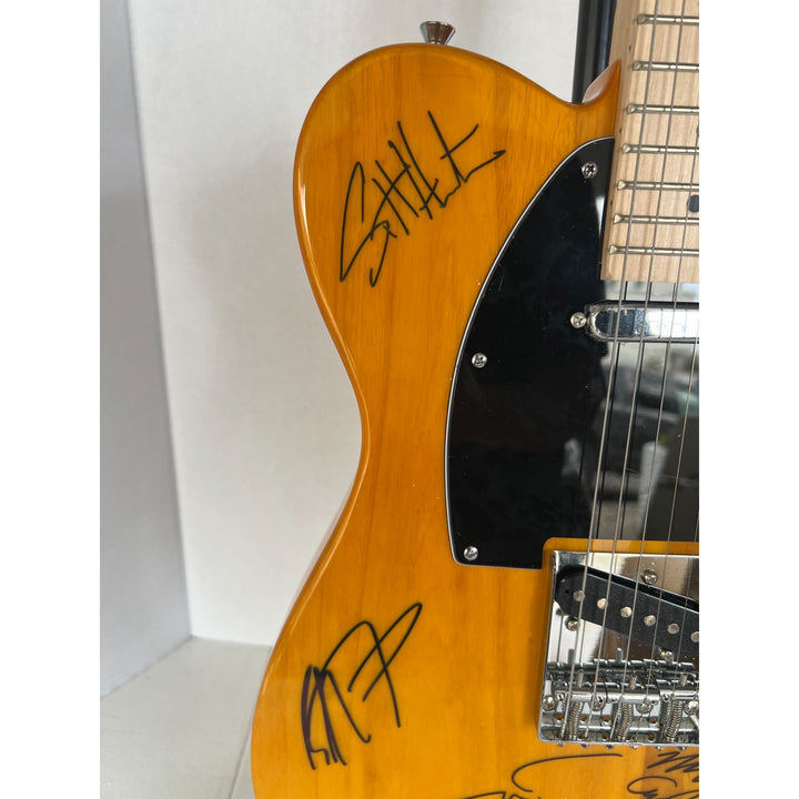 Tom Petty (with sketch) and The Heartbreakers, Ron Blair, Benmont Tench, Scott Thurston, and Mike Campbell full size electric guitar signed