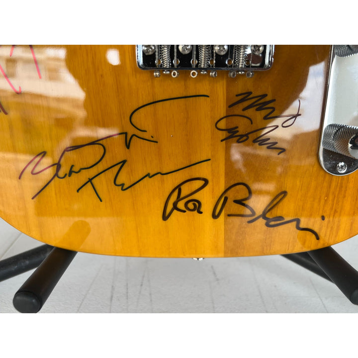 Tom Petty (with sketch) and The Heartbreakers, Ron Blair, Benmont Tench, Scott Thurston, and Mike Campbell full size electric guitar signed