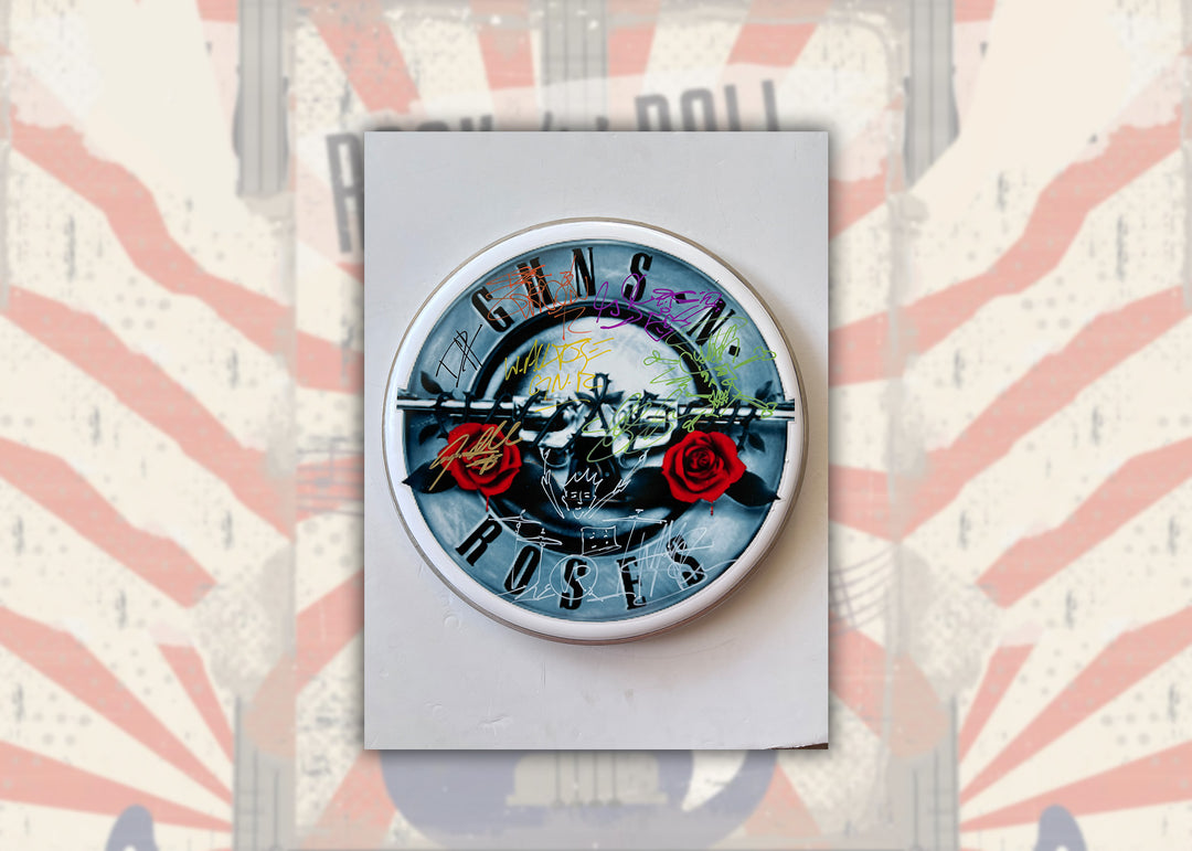 Guns n' Roses Slash, Axl Rose, Duff, Steven Adler, Matt Sorum, Izzy Stradlin, Gilby Clark one-of-a-kind drumhead signed with proof