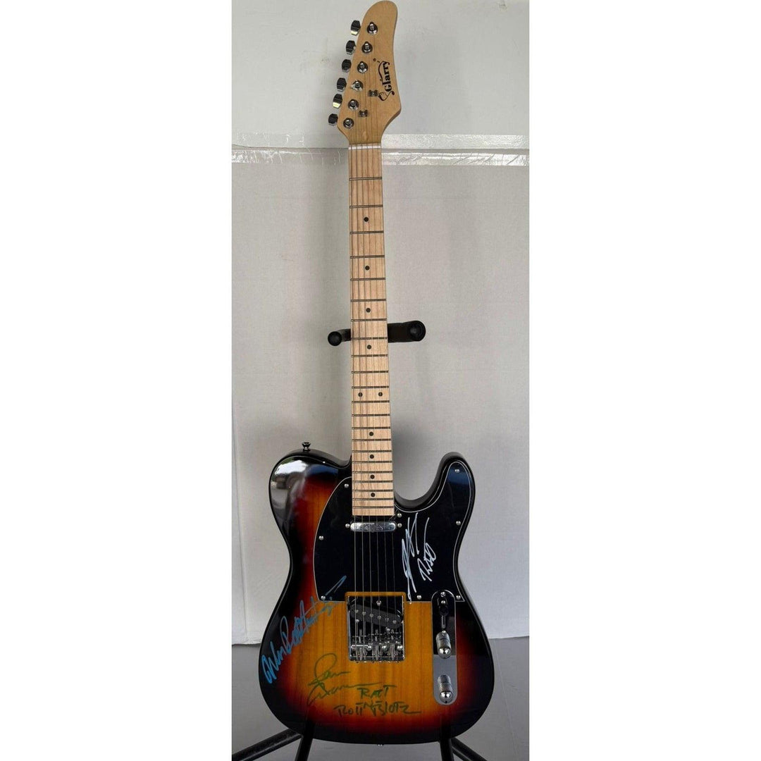 Ratt telecaster electric guitar signed by Warren DeMartini, Stephen Pearcy, Bobby Blotzer, and Juan Croucier.