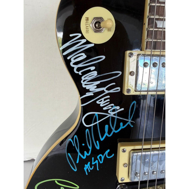 ACDC vintage black les paul electric guitar with Dave Evans, Colin Burgess, Bon Scott, Angus & Malcom Young, Cliff Williams & Phil Rudd.