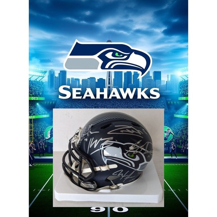 Seattle Seahawks Speed Riddell mini helmet with Sam Darnold Jaxon -Smith  Njigba, Kenneth Walker 11, Zach Charbonnet, Cooper Kupp signed
