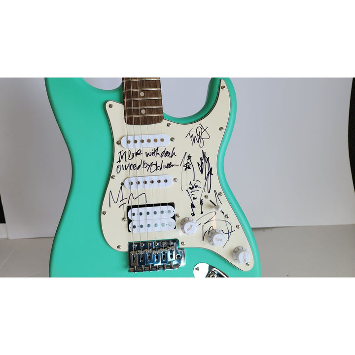 Brian Hugh Warner "Marilyn Manson" signed with inscription & Johnny Depp signed with self sketch with proof