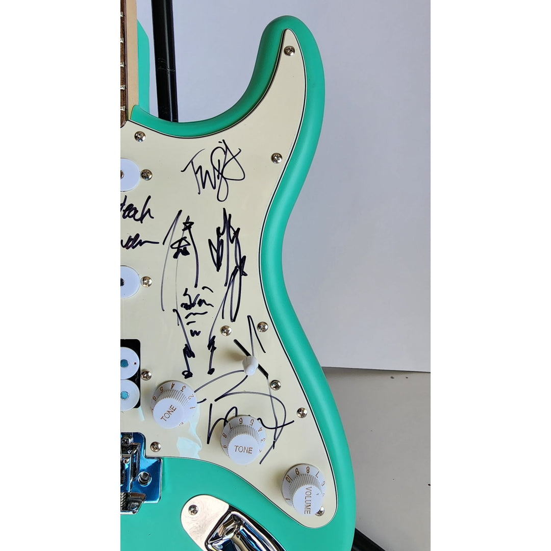 Brian Hugh Warner "Marilyn Manson" signed with inscription & Johnny Depp signed with self sketch with proof