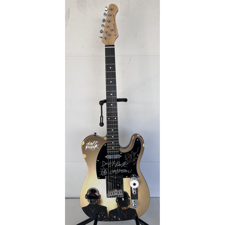 Daft Punk (Thomas Bangalter & Guy Manuel de Homem-Christo) signed with sketch on "One of a Kind" telecaster full size electric guitar.