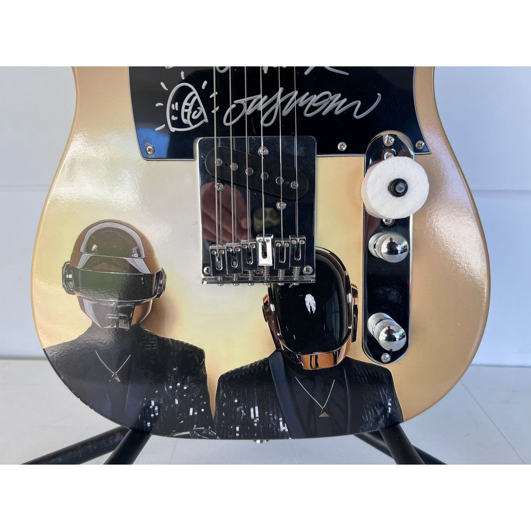 Daft Punk (Thomas Bangalter & Guy Manuel de Homem-Christo) signed with sketch on "One of a Kind" telecaster full size electric guitar.