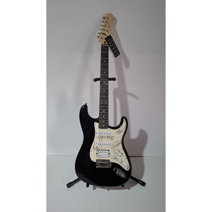 Chris Rich Robinson, Steve Gorman The Black Crowes Fender Stratocaster electric guitar signed with proof