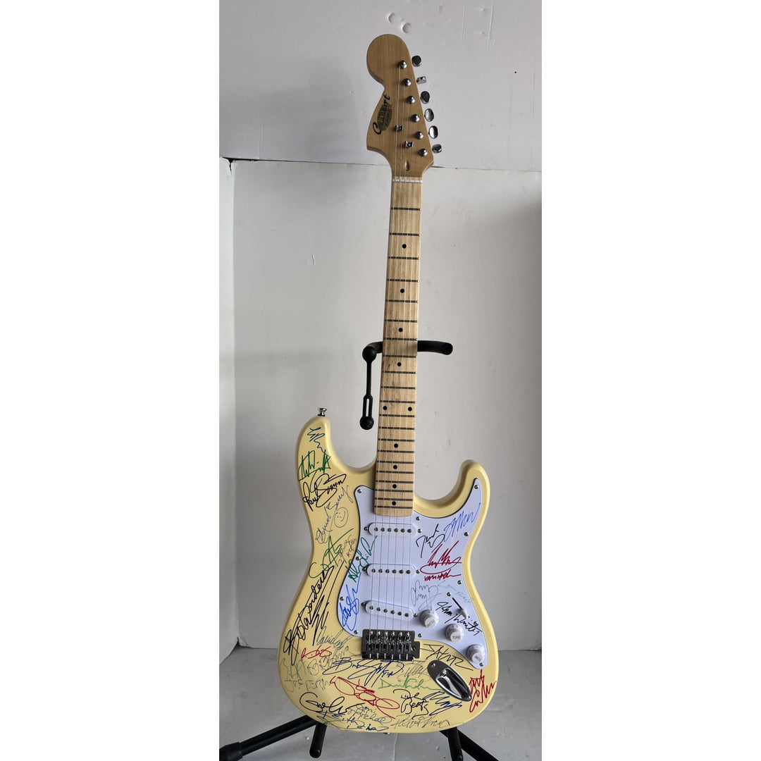 Guitar legends 33 signed in all Angus Young, Paul Simon, Jimmy Page, David Gilmour, Jimmy Hendrix model guitar signed with proof