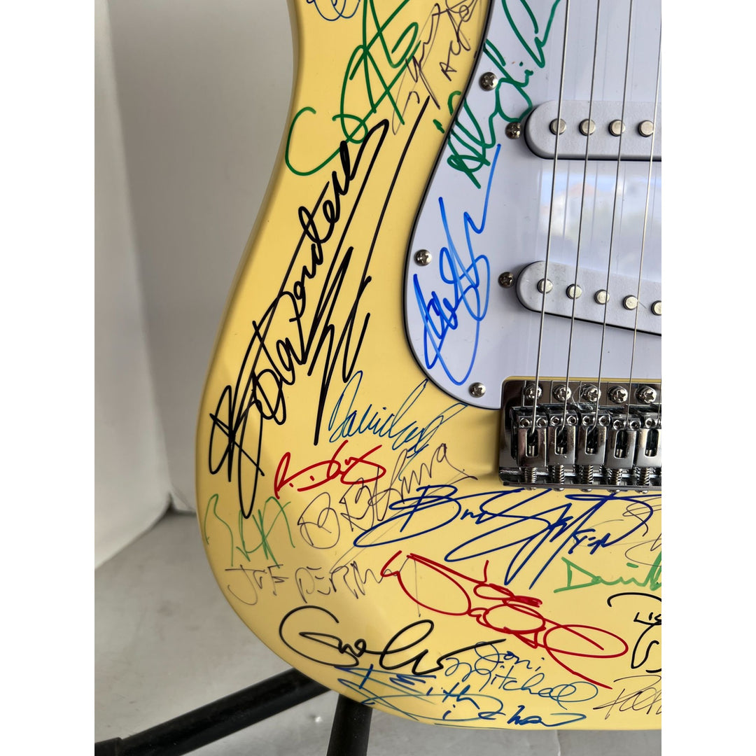 Guitar legends 33 signed in all Angus Young, Paul Simon, Jimmy Page, David Gilmour, Jimmy Hendrix model guitar signed with proof