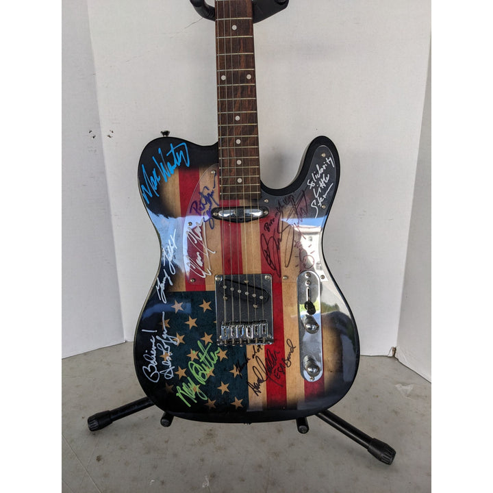 Bruce Springsteen, Clarence Clemens and the E Street band American flag telecaster electric guitar signed with proof