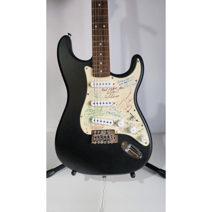 Lynyrd Skynyrd Johnny Van Zant Gary Rossington, Rickey Medlocke, Billy Powell, Ed King, Leon Wilkeson, Artimus Pyle & Alan Collins Fender signed with proof