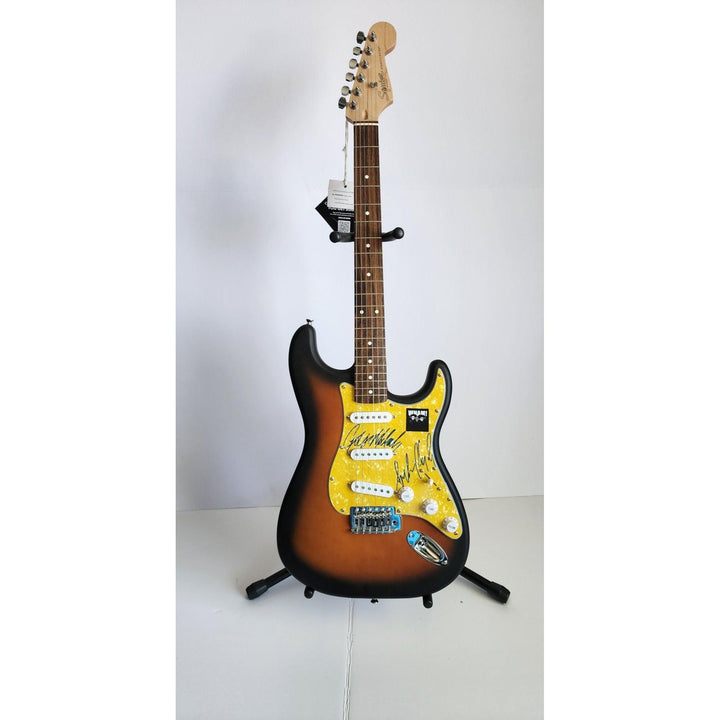George Michael & Andrew Ridgeley Wham genuine Fender Stratocaster electric guitar signed with proof