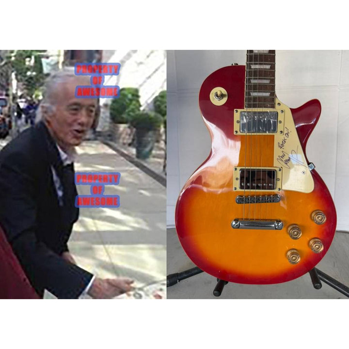 Jimmy Page of Led Zeppelin, Les Paul, vintage, electric guitar signed with full provenance, photo proof and AI certification.
