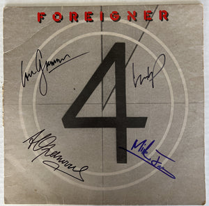 Mick Jones and Lou Gramm, Dennis Elliott, Rick Wills Foreigner LP with proof