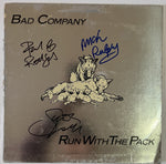 Load image into Gallery viewer, Paul Rodgers Mick Ralphs, Boz Burrell, Simon Kirke - Bad Company &quot;Run With The Pack&quot; LP signed with proof
