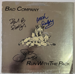 Paul Rodgers Mick Ralphs, Boz Burrell, Simon Kirke - Bad Company "Run With The Pack" LP signed with proof