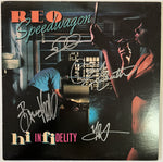 Load image into Gallery viewer, Reo Speedwagon Neil Doughty Bruce Hall &quot;High Infidelity&quot; LP signed with proof
