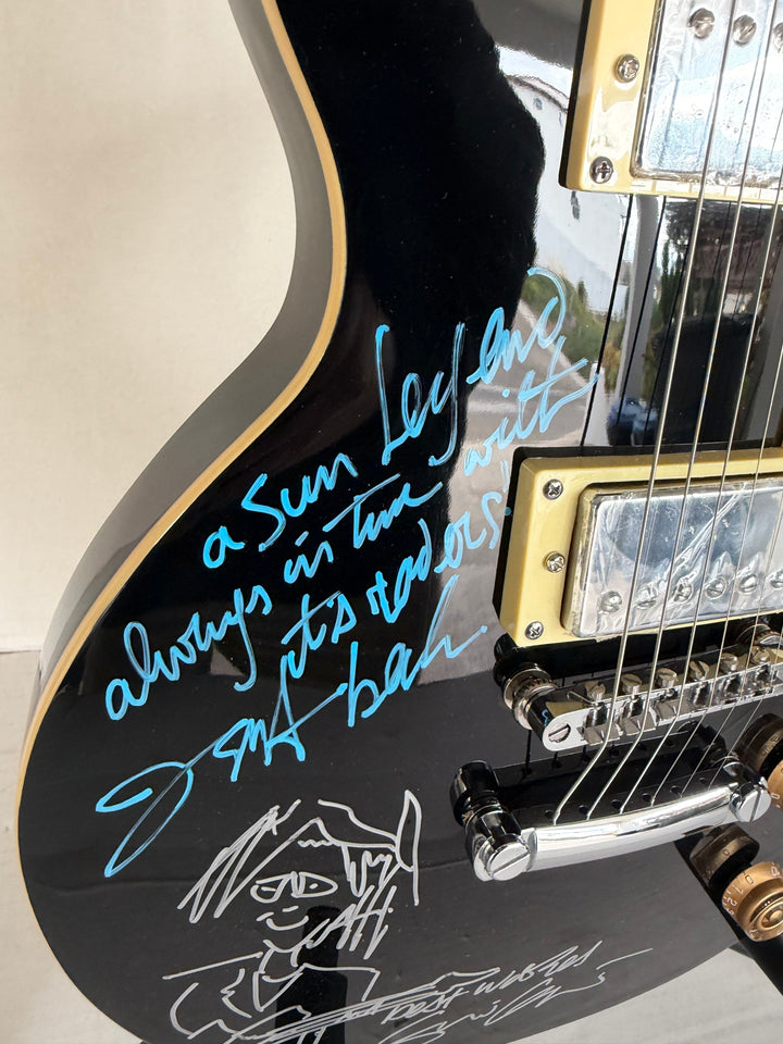 The  Yardbirds Jimmy Page Eric Clapton & Jeff Beck vintage black Les Paul Electric Guitar signed with proof.