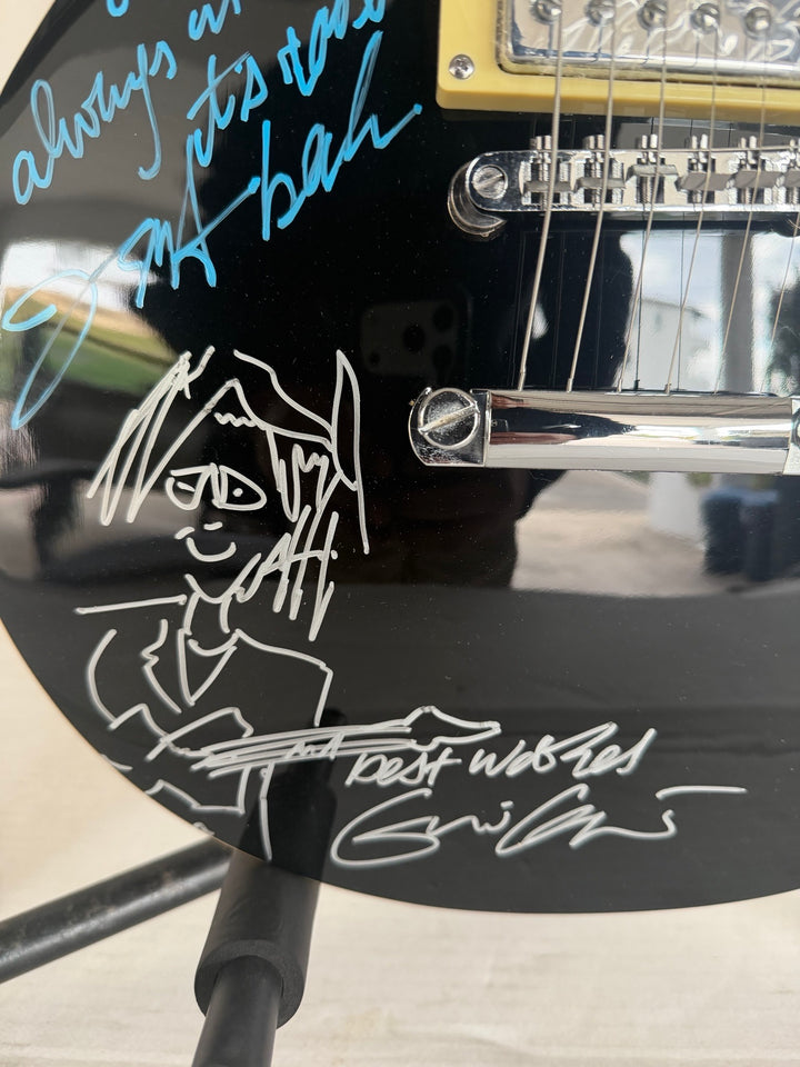 The  Yardbirds Jimmy Page Eric Clapton & Jeff Beck vintage black Les Paul Electric Guitar signed with proof.
