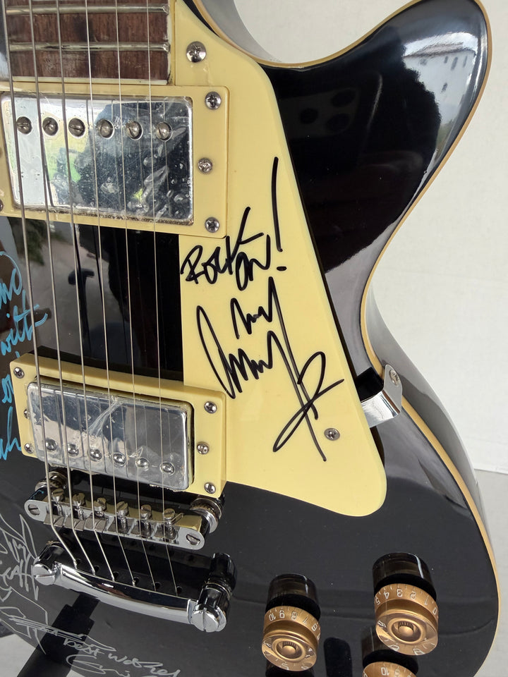 The  Yardbirds Jimmy Page Eric Clapton & Jeff Beck vintage black Les Paul Electric Guitar signed with proof.