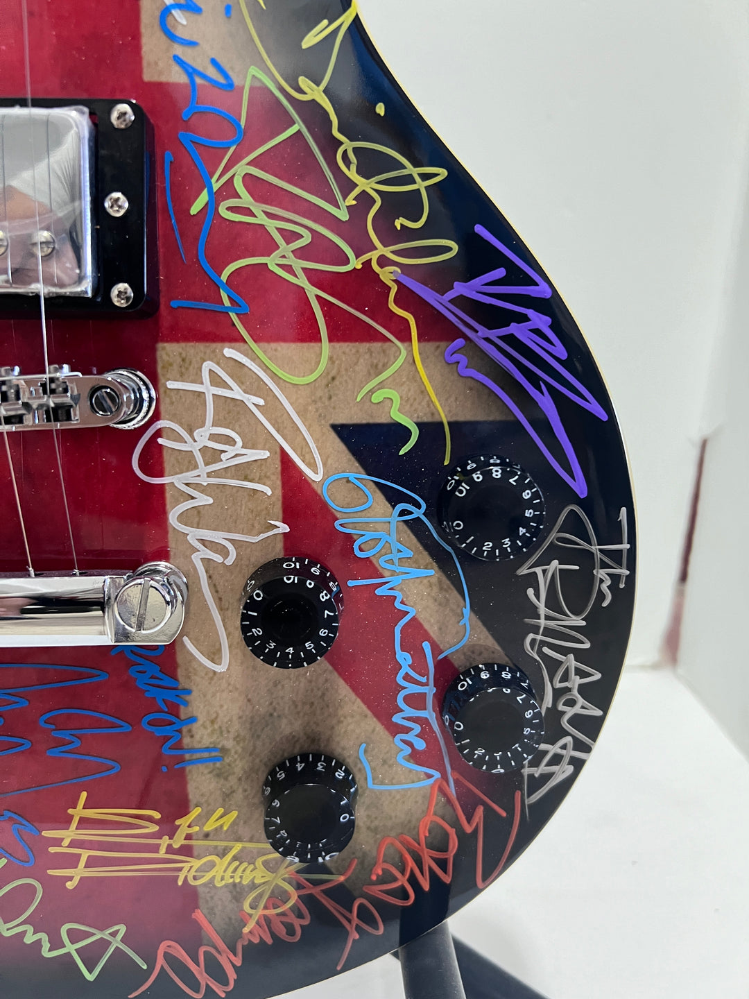 Paul McCartney, Ozzy Osbourne, Jimmy Page, Keith Richards, Eric Clapton British Rock icons one-of-a-kind electric guitar signed by 26 with proof