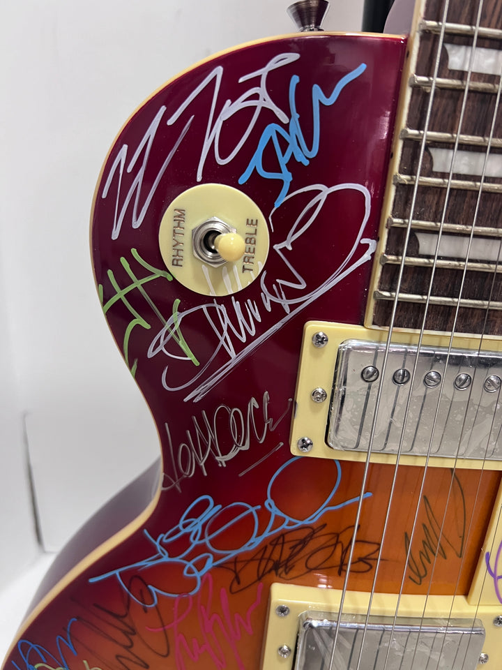 Guitar legends 36 signed in all Angus Young, Paul Simon, Jimmy Page, David Gilmour, Jimmy Hendix model guitar signed with proof