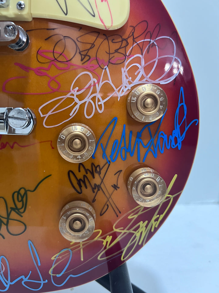 Guitar legends 36 signed in all Angus Young, Paul Simon, Jimmy Page, David Gilmour, Jimmy Hendix model guitar signed with proof