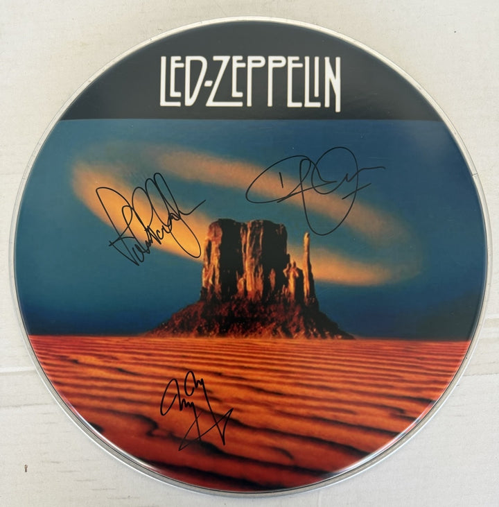 Led Zeppelin Jimmy Page Robert Plant & John Paul Jones drumhead signed with proof