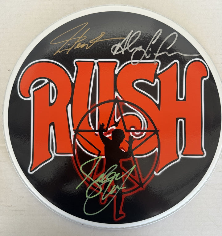 Geddy Lee Alex Lifeson Neil Peart Rush drumhead signed with proof.