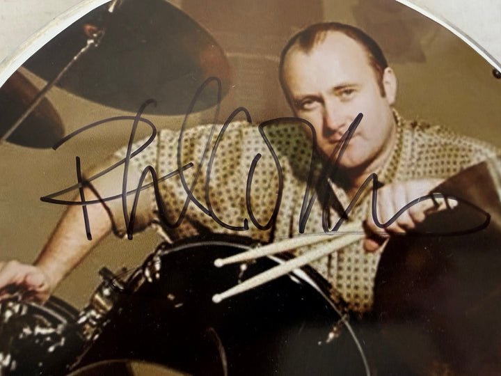 Phil Collins iconic Genesis drummer one of a kind drumhead signed with proof