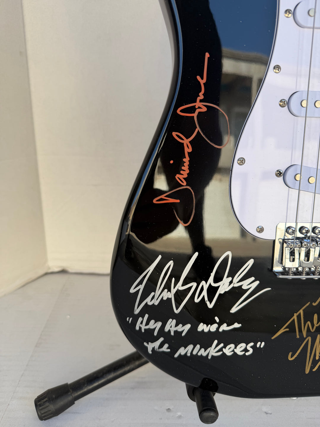 The Monkees Michael Nesmith, Peter Tork, Micky Dolenz, and Davey Jones full size Stratocaster electric guitar signed with proof