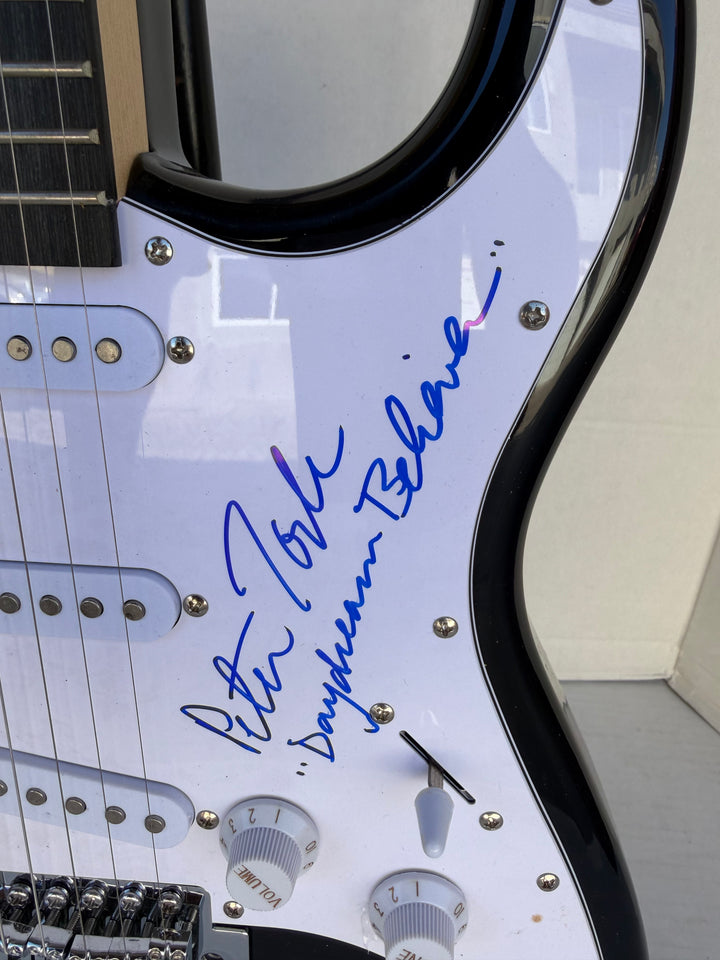 The Monkees Michael Nesmith, Peter Tork, Micky Dolenz, and Davey Jones full size Stratocaster electric guitar signed with proof
