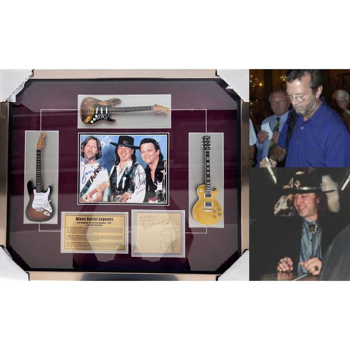 Stevie Ray and Jimmy Vaughan with Eric Clapton signed and framed with proof.