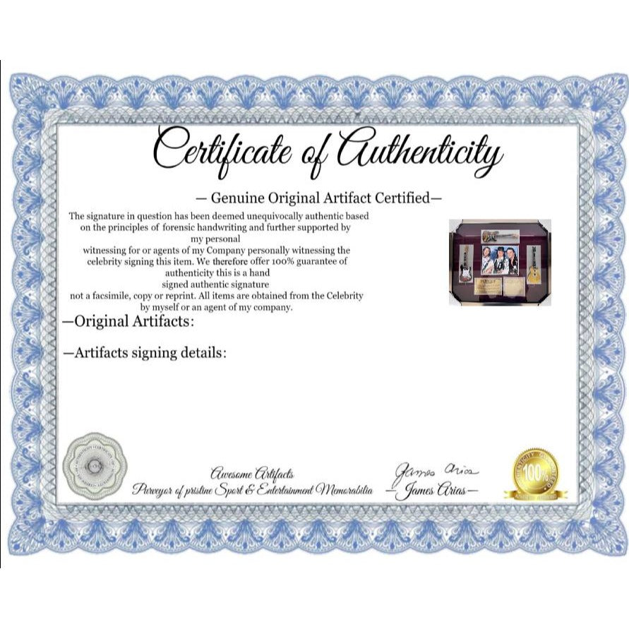 Stevie Ray and Jimmy Vaughan with Eric Clapton signed and framed with proof.