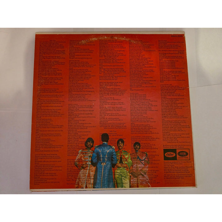 The Beatles "Sgt. Pepper's Lonely Hearts Club Band" LP signed with proof.