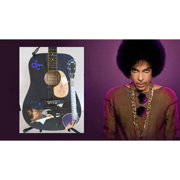 Prince Rogers Nelson   one of a kind full size acoustic guitar signed with poof.