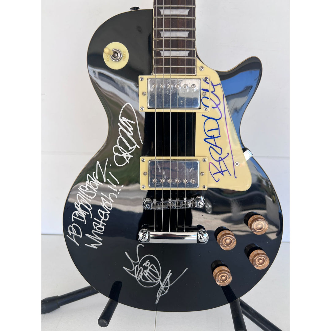Sublime Bradley Nowell, Eric Wilson, and Bud Gaugh vintage black les paul full size electric guitar signed with sketch/ inscription.