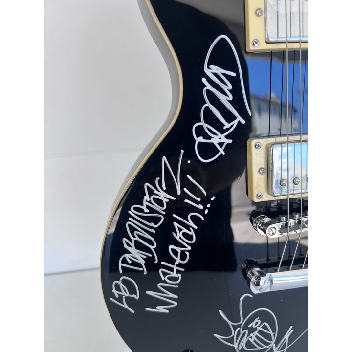 Sublime Bradley Nowell, Eric Wilson, and Bud Gaugh vintage black les paul full size electric guitar signed with sketch/ inscription.