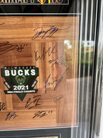 Load image into Gallery viewer, Milwaukee Bucks Giannis Antetokounmpo NBA champions 2020-2021 team parquet floorboard signed &amp; framed 32x18 with proof
