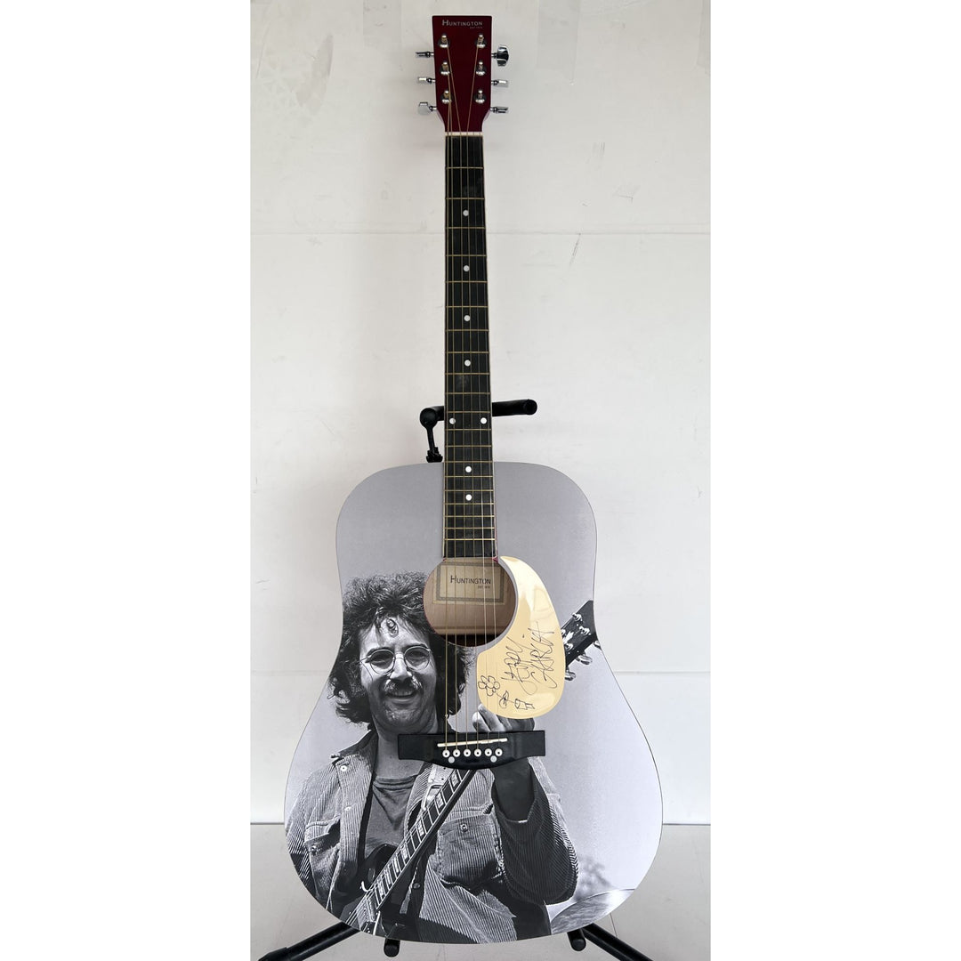 Jerry García legendary front man of the Grateful Dead (one of a kind acoustic guitar) signed with sketch & proof.
