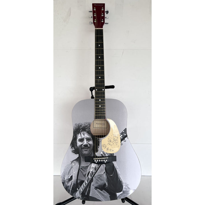 Jerry García legendary front man of the Grateful Dead (one of a kind acoustic guitar) signed with sketch & proof.