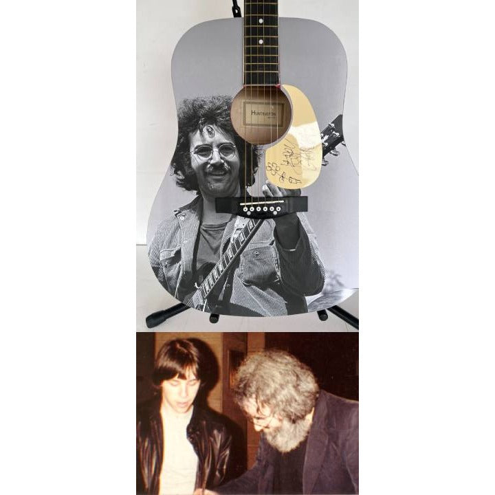 Jerry García legendary front man of the Grateful Dead (one of a kind acoustic guitar) signed with sketch & proof.