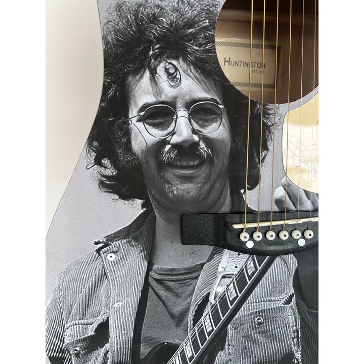 Jerry García legendary front man of the Grateful Dead (one of a kind acoustic guitar) signed with sketch & proof.