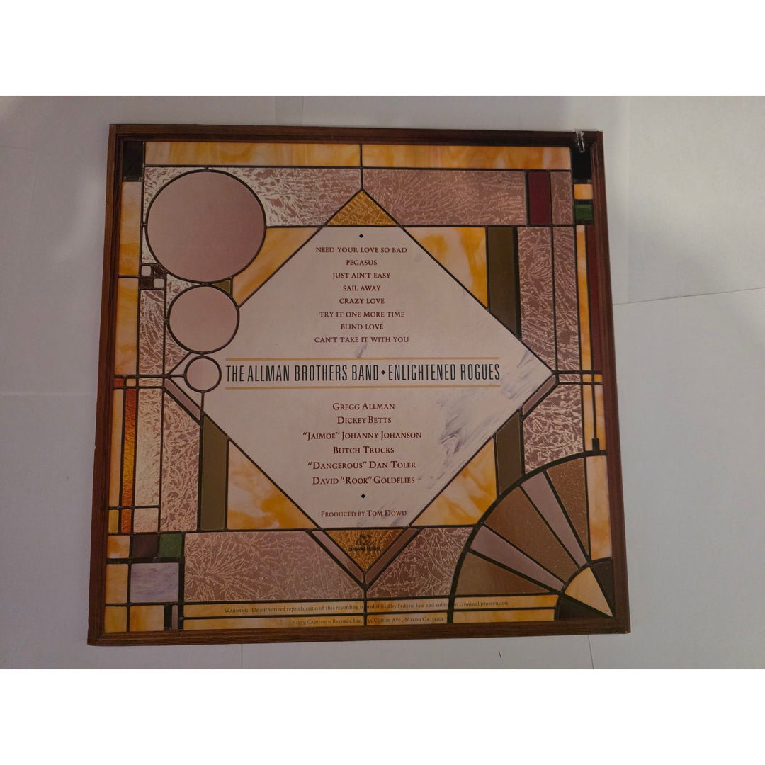 The Allman Brothers "Enlightened Rogues" LP signed with proof.