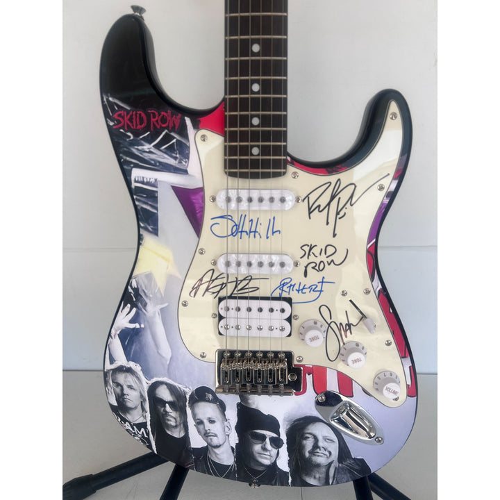 Skid Row Sebastian Bach Dave Sarbo, Sciottie Hill "one of a kind" full size electric guitar signed with proof.